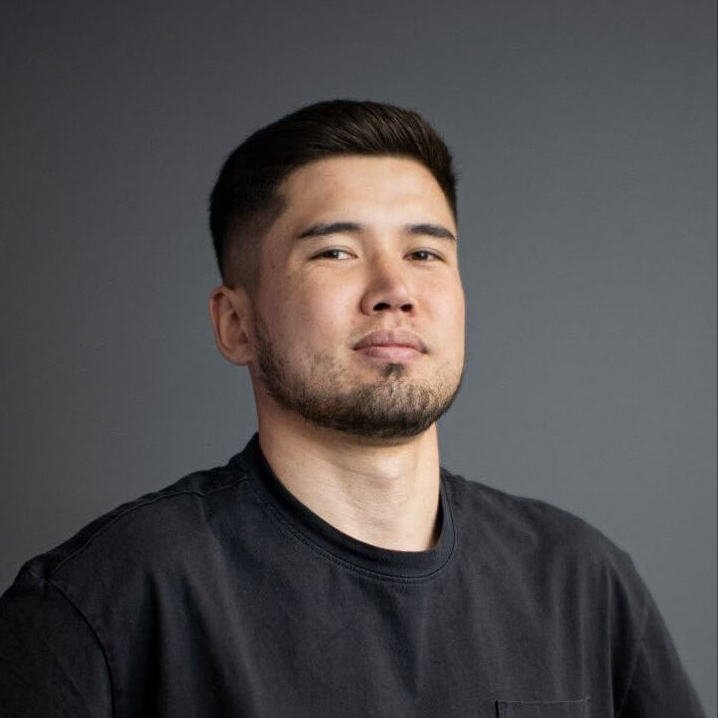 NJ, professional barber with 8+ years experience, working on a customer's haircut